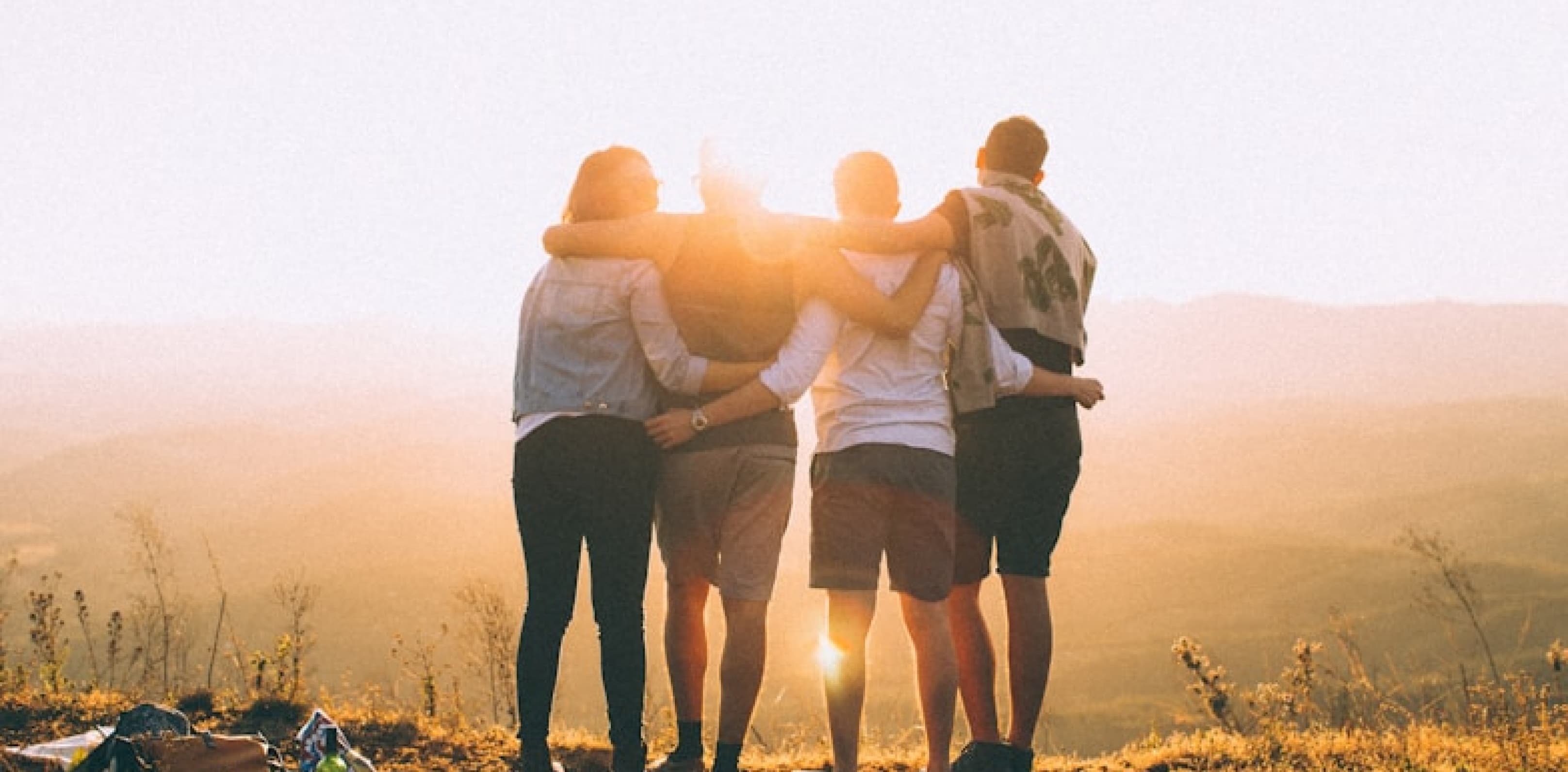 Friends Hugging in the Field